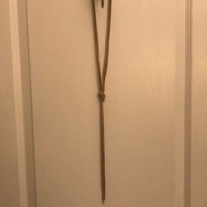 Long knotted gold loop necklace